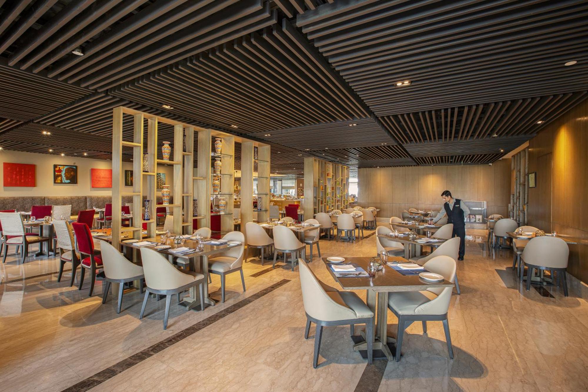 فندق ذا ليلا أمبيانس كونفينشن دلهي نيودلهي المظهر الخارجي الصورة The restaurant