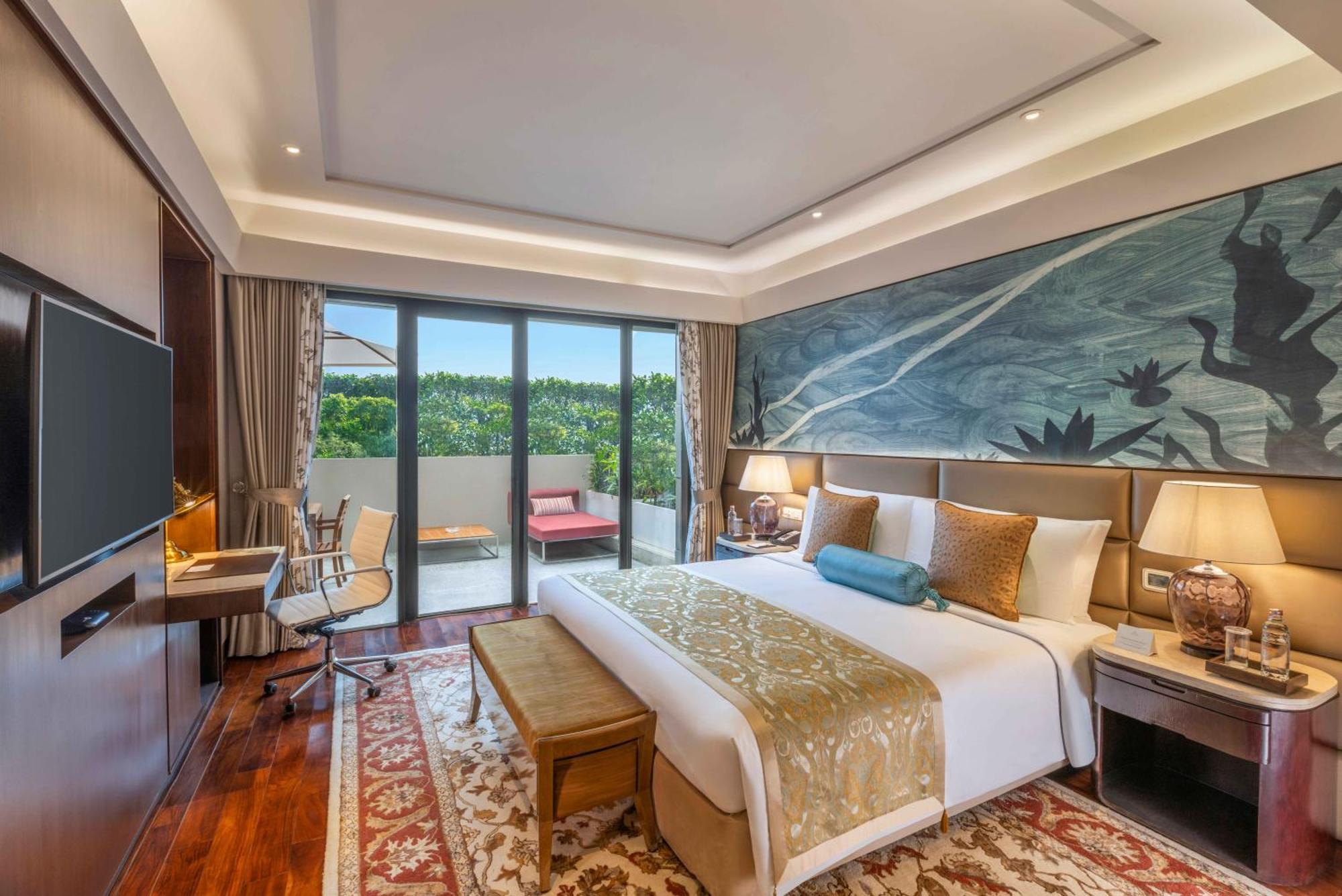 فندق ذا ليلا أمبيانس كونفينشن دلهي نيودلهي المظهر الخارجي الصورة A bedroom at the hotel